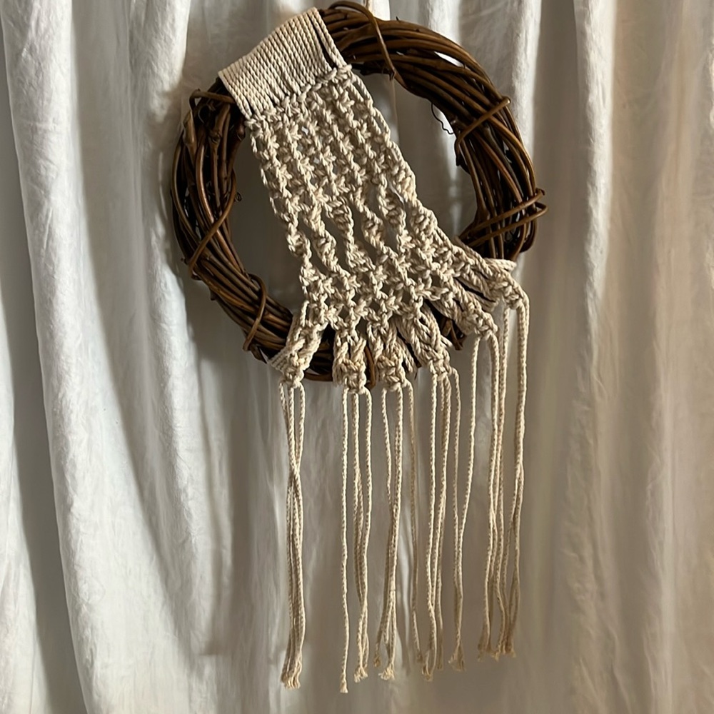 Macrame wall hanging on grapevine wreath
